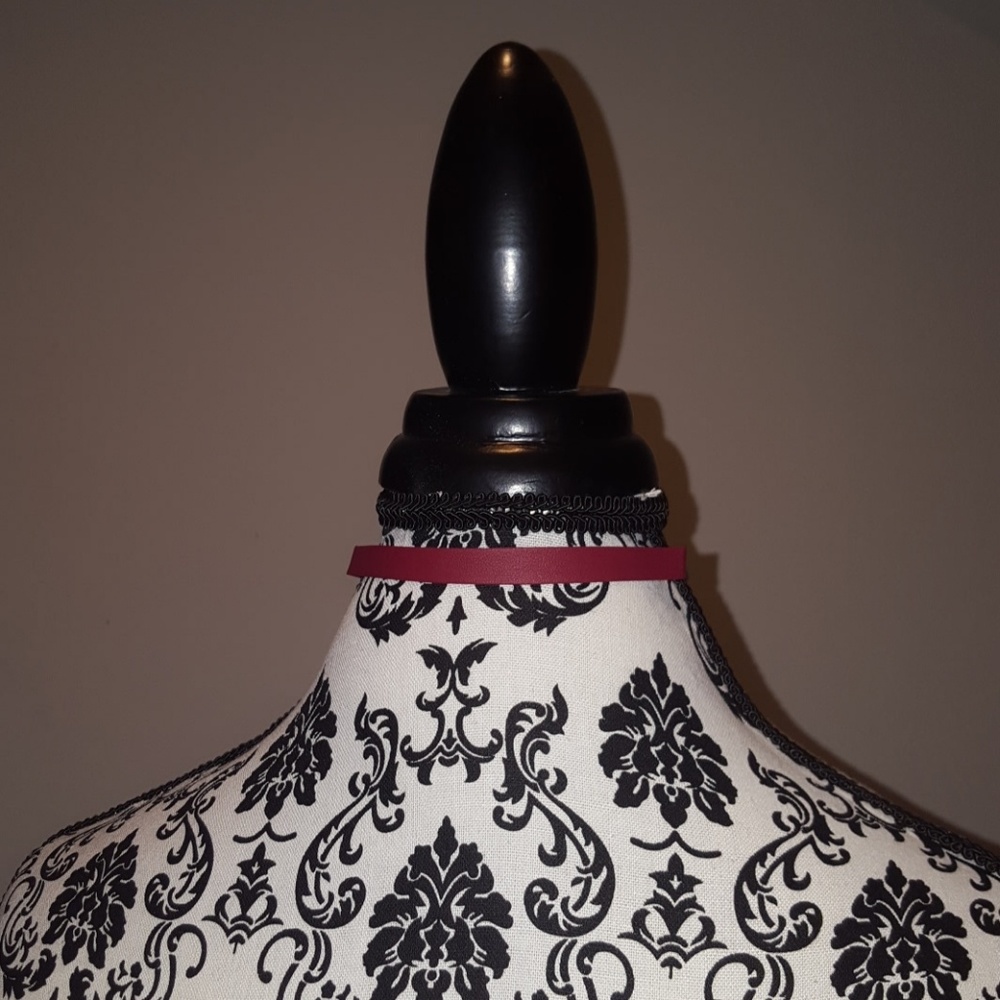 Choker with gold painted claps
